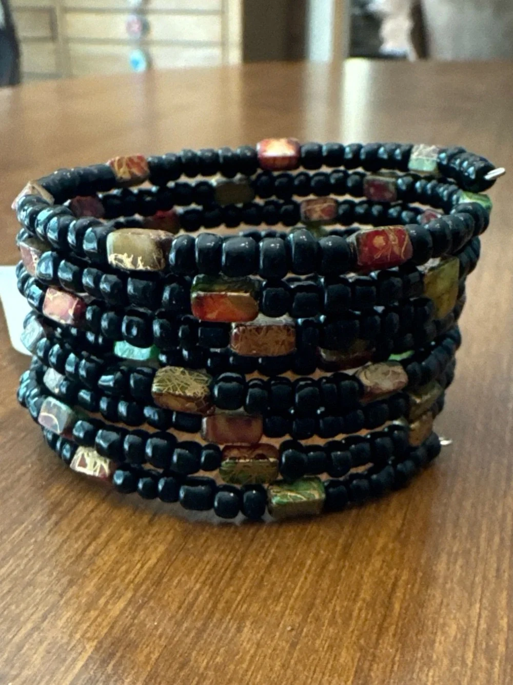 Handcrafted Black Beaded Coil Bracelet with Multicolor Accent Beads
